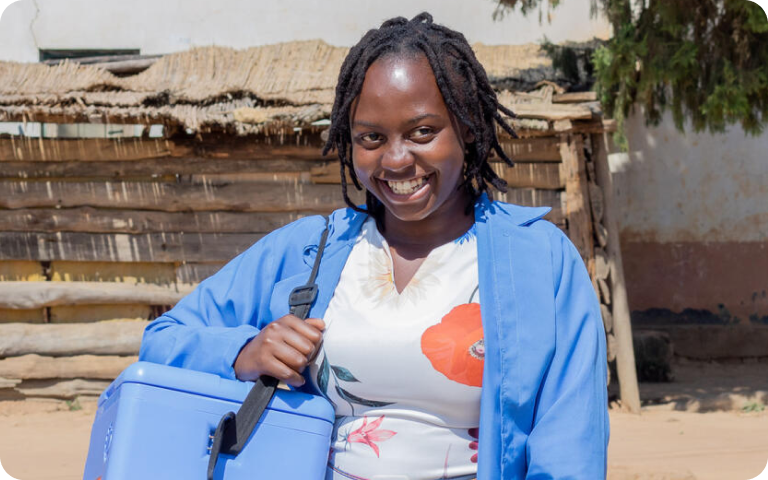 Health worker with vaccine carrier